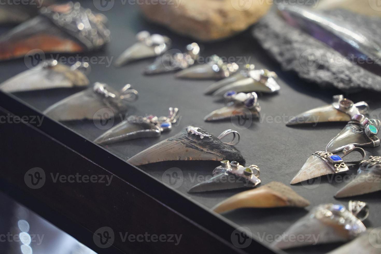 shark teeth pendant in jewelry store photo