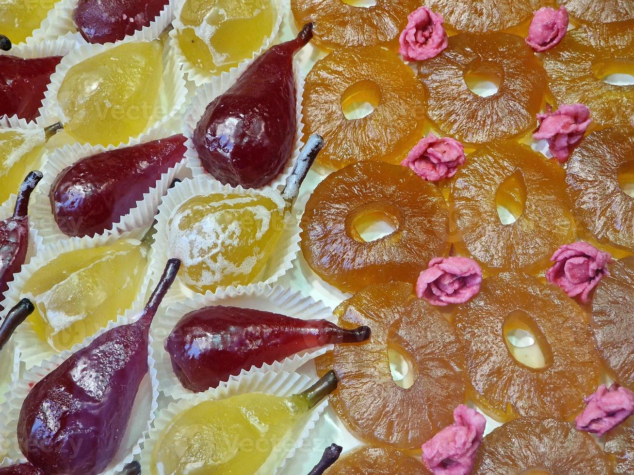 fresh glazed fruit sweet on display in pastry shop photo