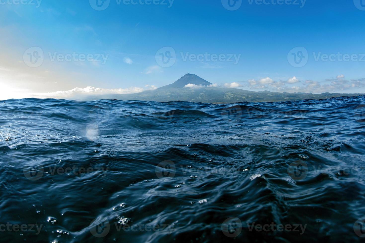 pico volcano view from ocean while swimming photo