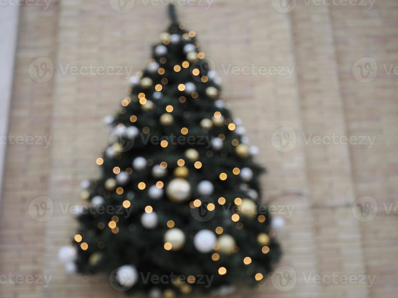 Close up of balls on christmas tree. Bokeh garlands in the background. New Year concept. photo