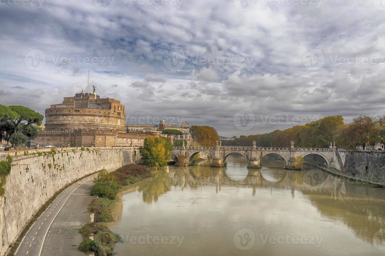 Castel Sant'Angelo and the Sant'Angelo bridge during sunny day in Rome photo