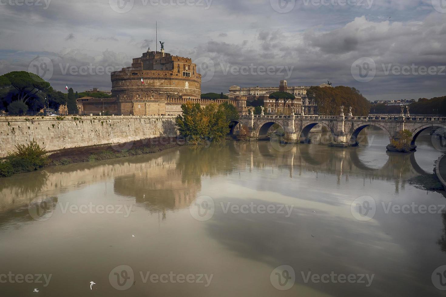 Castel Sant'Angelo and the Sant'Angelo bridge during sunny day in Rome photo