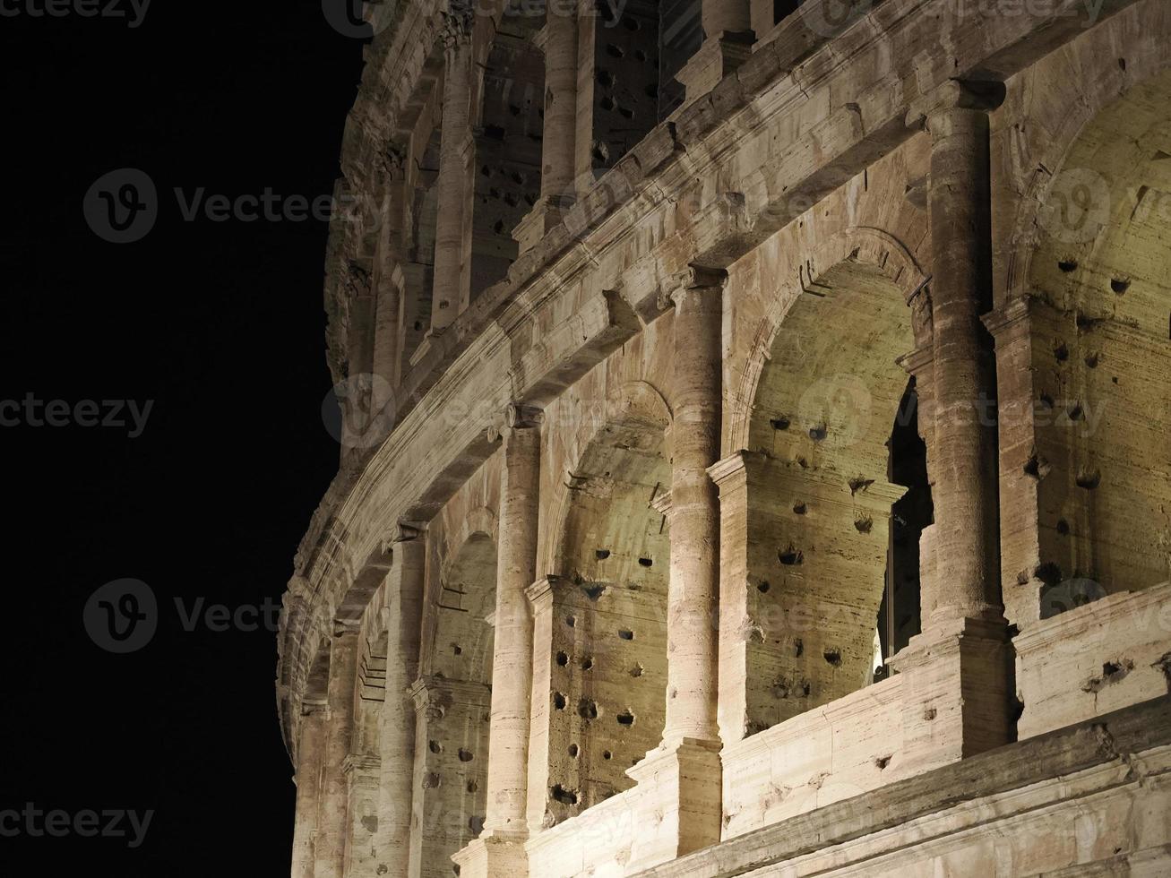 Colosseum Rome interior view at night photo