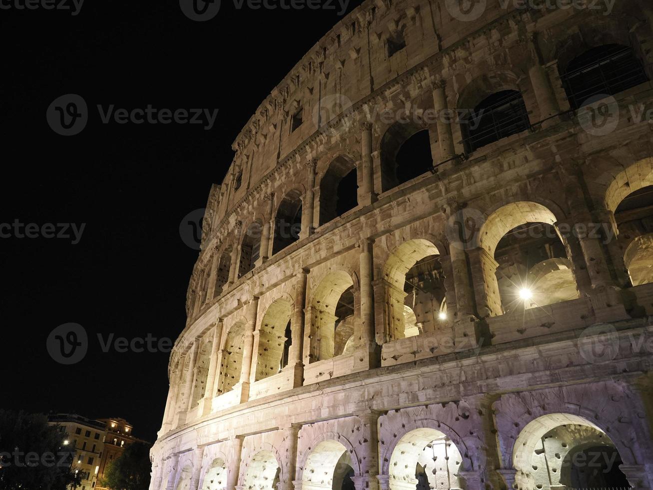 Colosseum Rome interior view at night photo