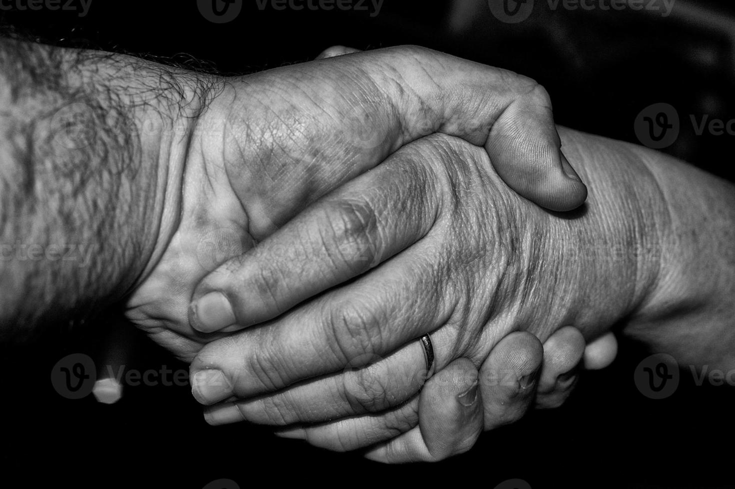 Lovers man and woman crossed hands photo