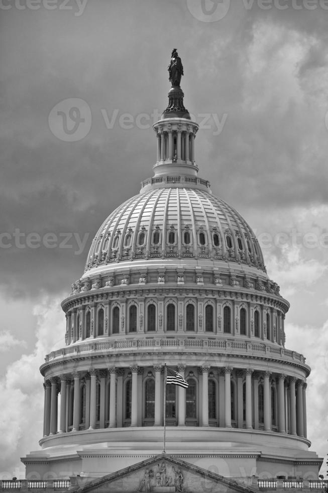 Washington DC Capitol detail on cloudy sky in black and white photo