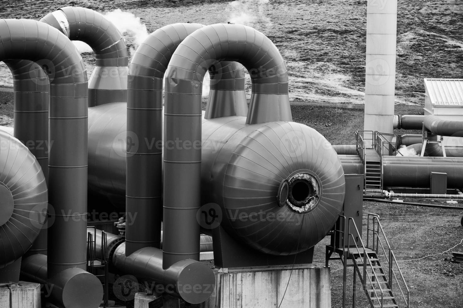 A pipeline in the heating geo thermal farm in Iceland photo