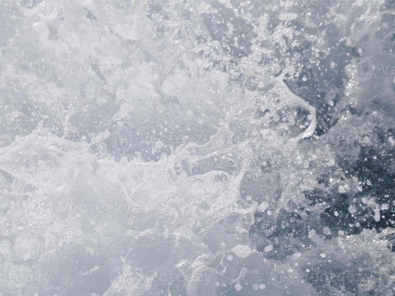 detalle de salpicaduras de agua y pequeñas gotas foto