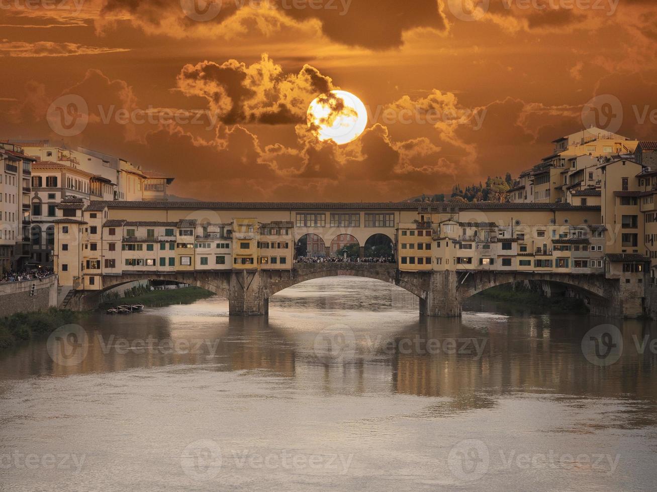 ponte vecchio bridge florence at sunset photo