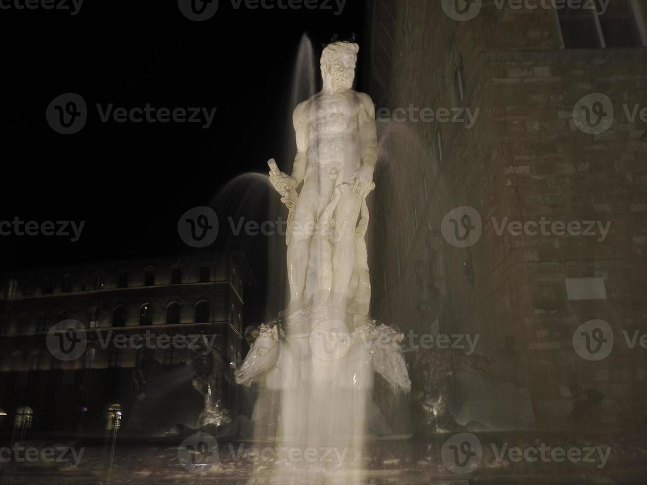 florence neptune statue della signoria place at night photo