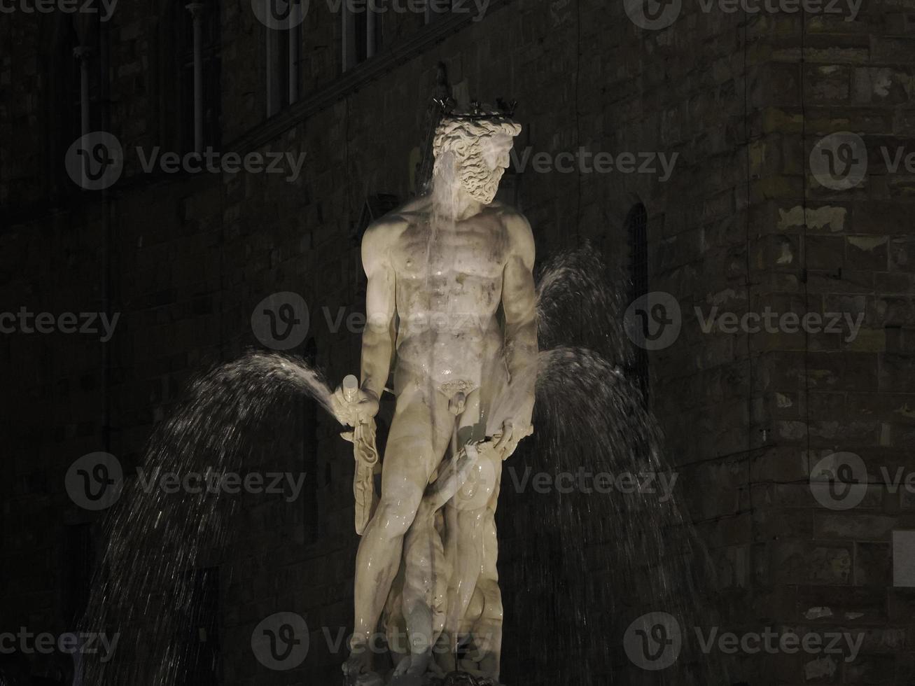 florence neptune statue della signoria place at night photo