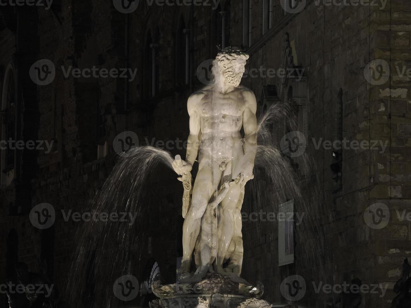 florence neptune statue della signoria place at night photo