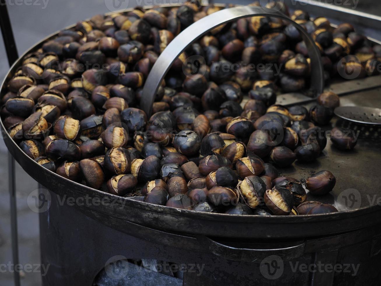 street roasted chestnut in rome road food seller photo