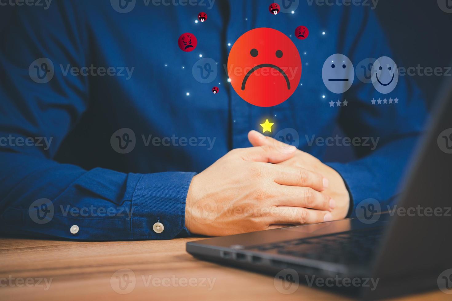 Unhappy man customer with sad emotion face on laptop. Bad review and service dislike poor quality, low rating, bad social media not good. Customer experience dissatisfied and testimonial concept. photo