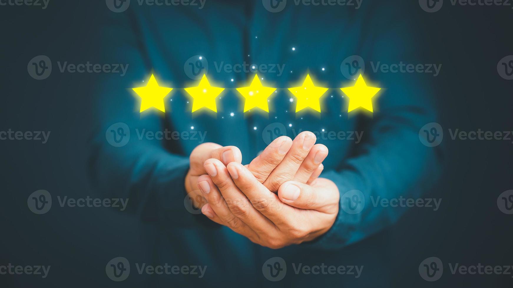 Man give positive reviews for customer satisfaction surveys, Five star rating, Customer assessment feedback, Service rating satisfaction and testimonial concept. photo