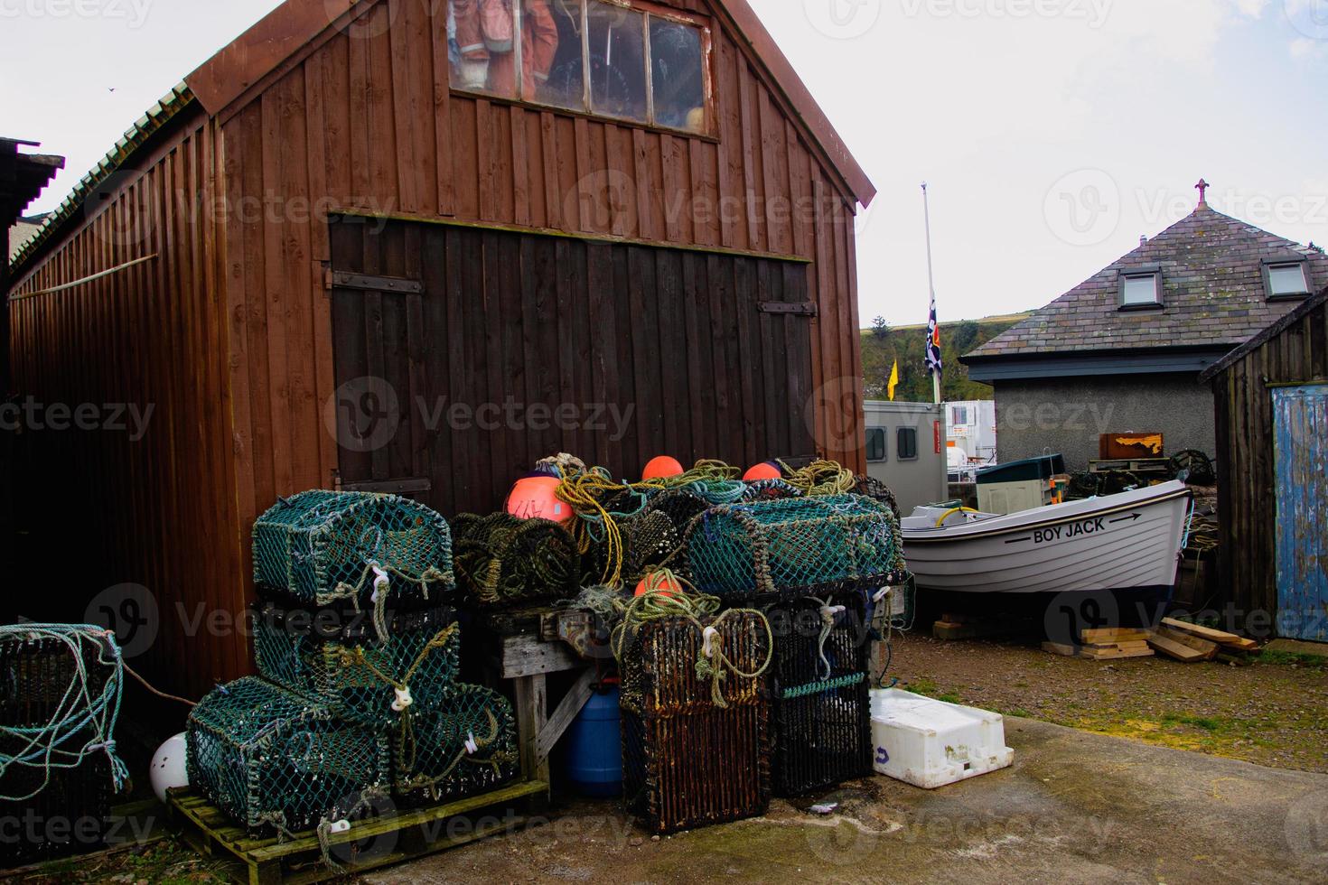 cages on a fishing in stonehaven, Scotland photo