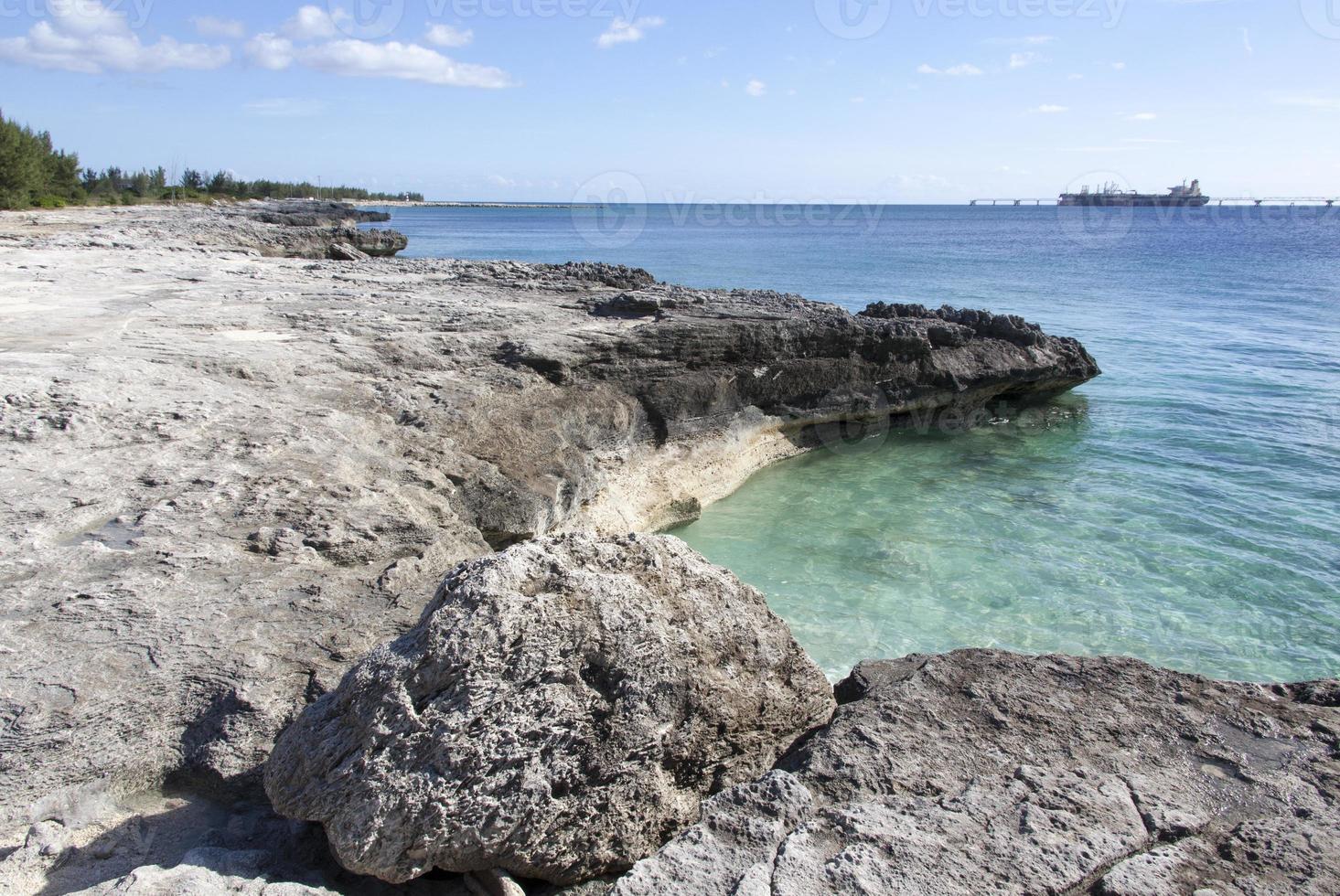 Grand Bahama Island Rocky Coastline And Industrial Ship photo