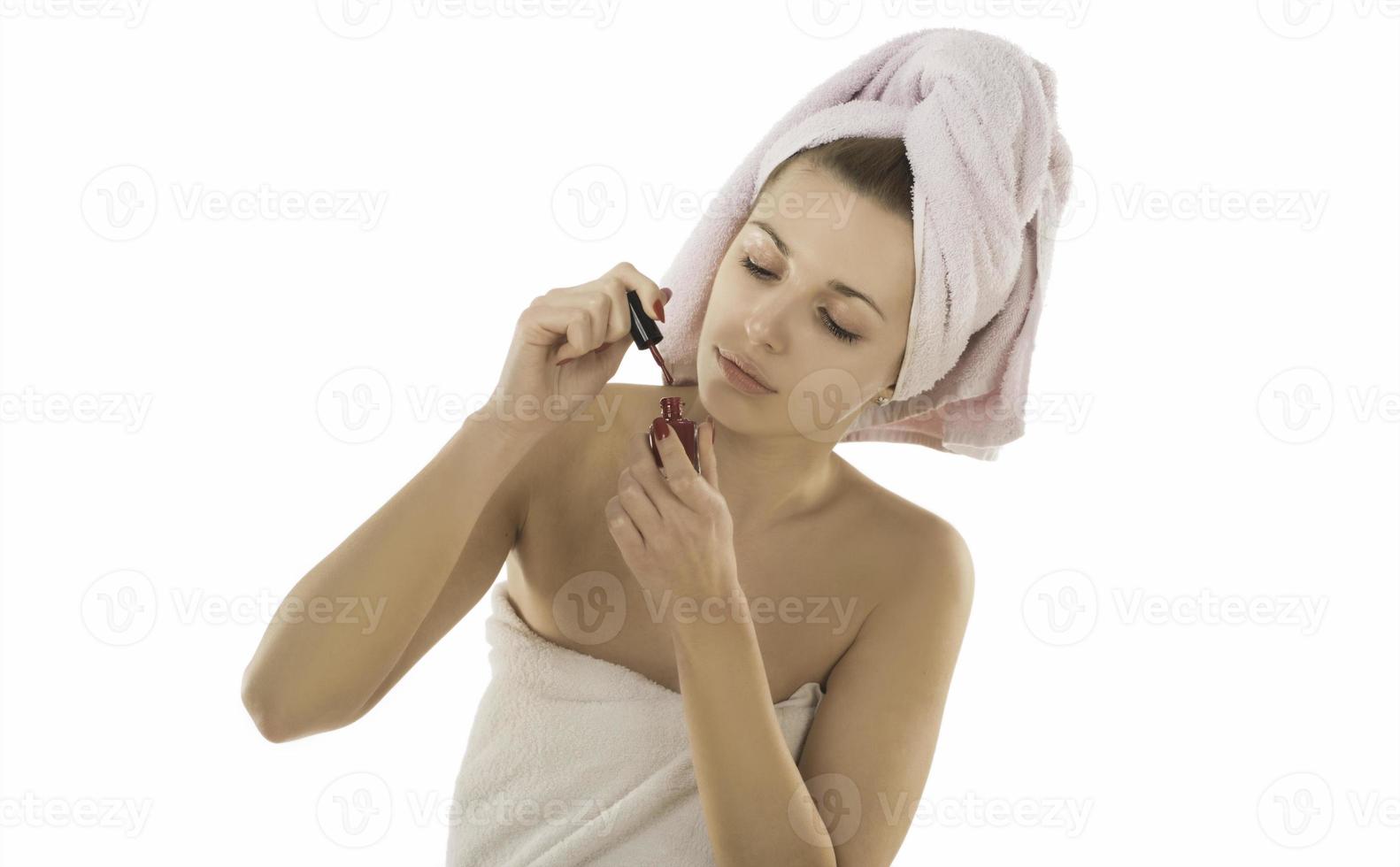 Manicure - Beautiful manicured woman's nails with red nail polish photo