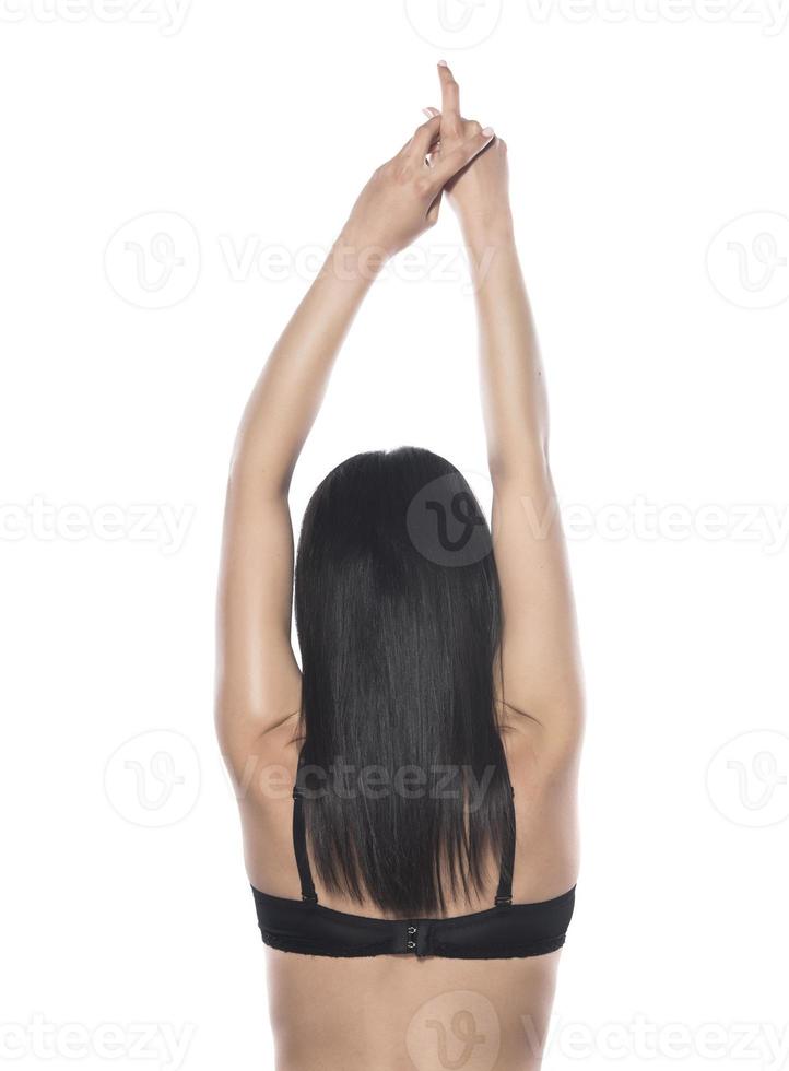 Back view of beautiful black haired woman photo