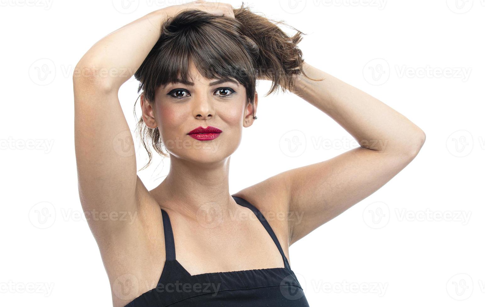 shot of young beautiful girl with hair bun photo