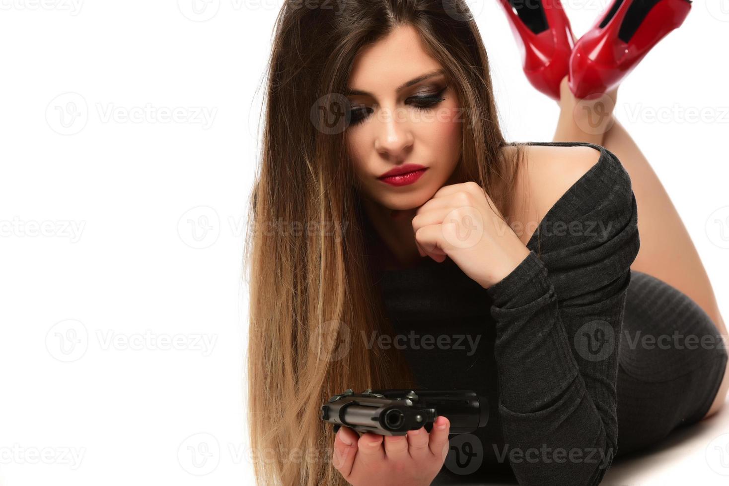 Woman With Handgun photo