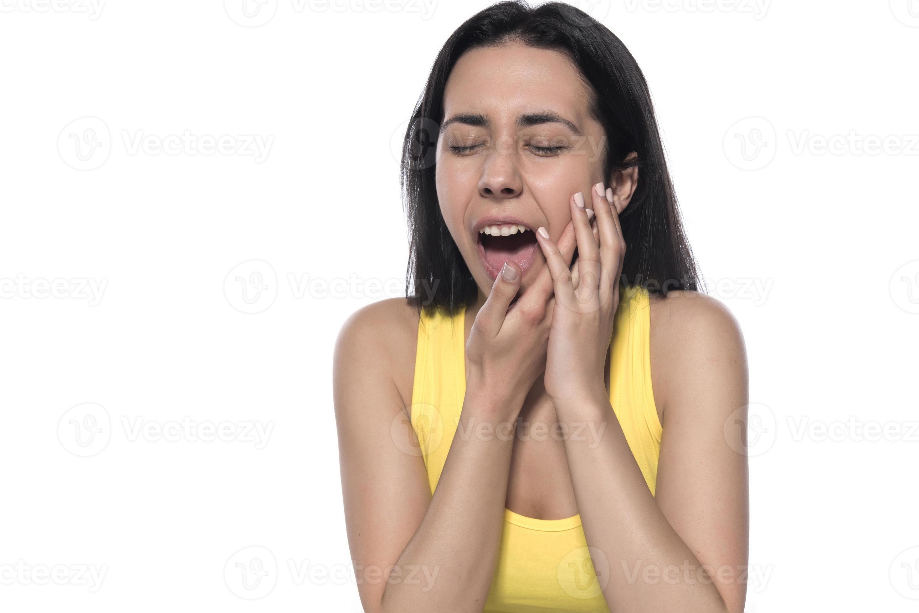 Tooth Pain And Dentistry. Beautiful Young Woman Suffering From Terrible