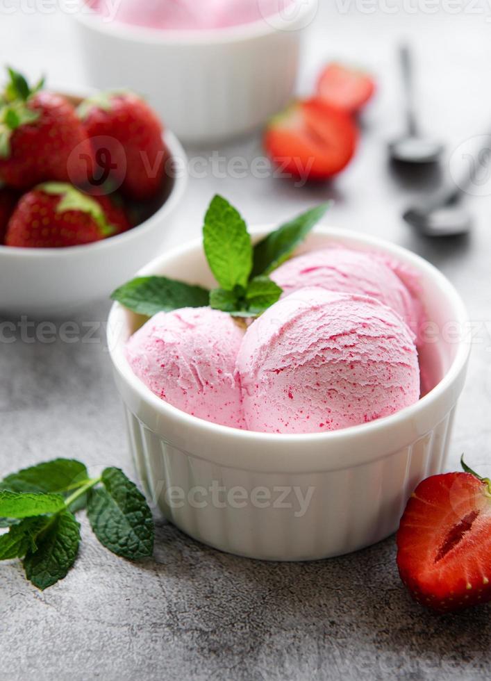 Homemade strawberry  ice cream with fresh strawberries photo