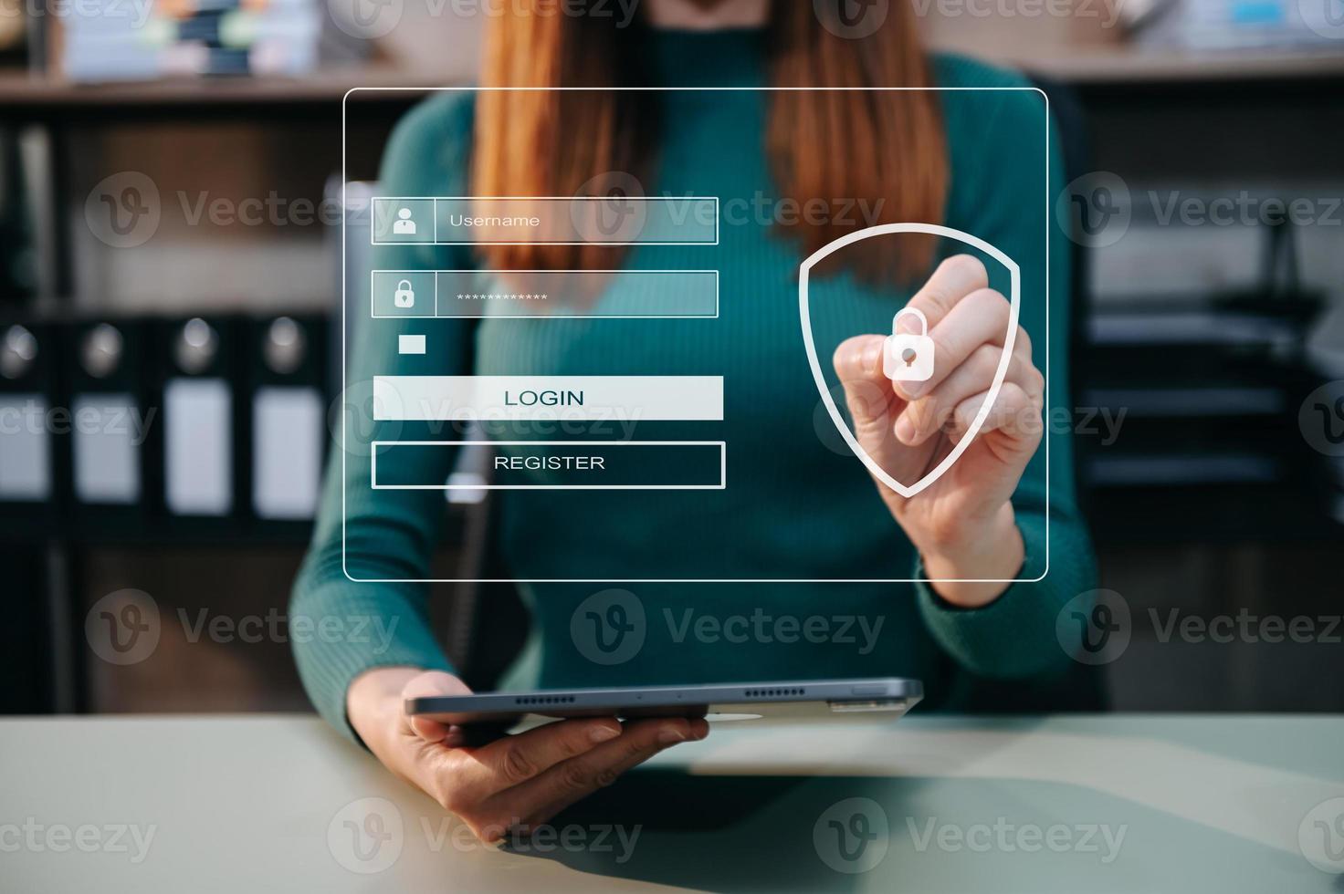 Cyber security concept, Login, User, identification information security and encryption, secure access to user's personal information woman using smart phone and tablet in office photo