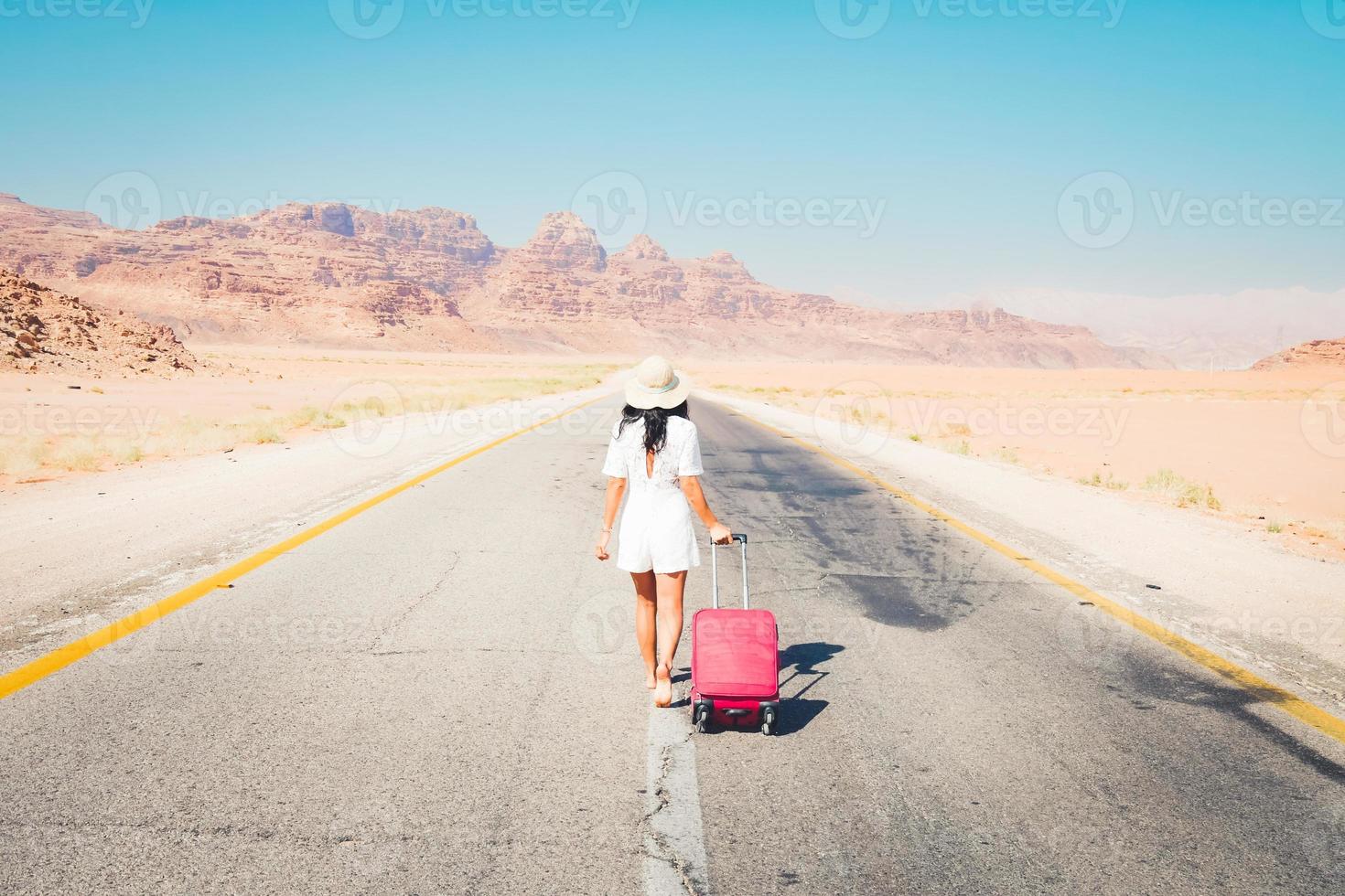 Cute young woman traveler on road dream about travel outdoors. Vintage travel carefree holiday tourism concept photo