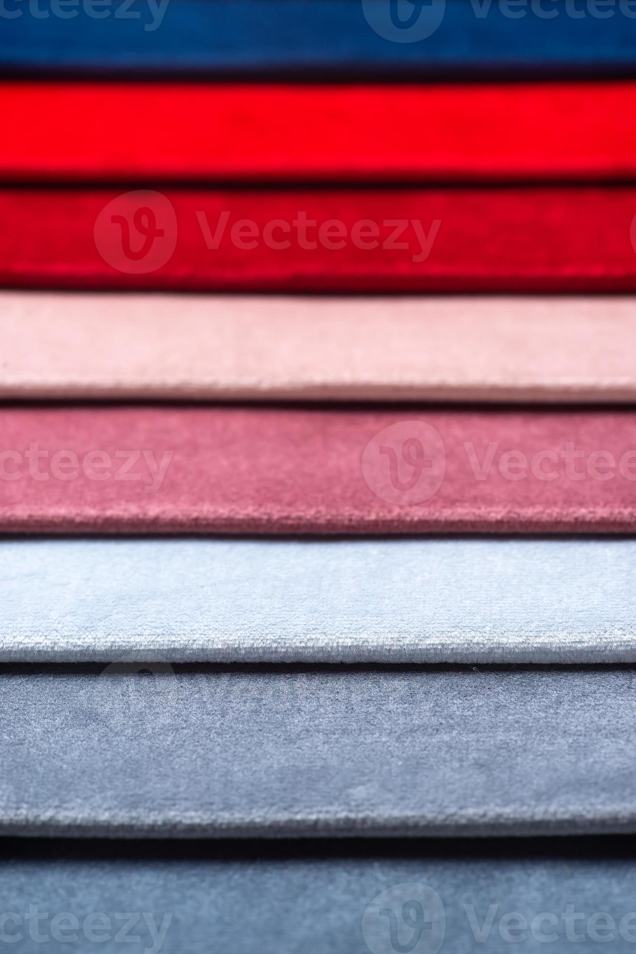 Multi colored set of upholstery fabric samples for selection, collection of textile swatches