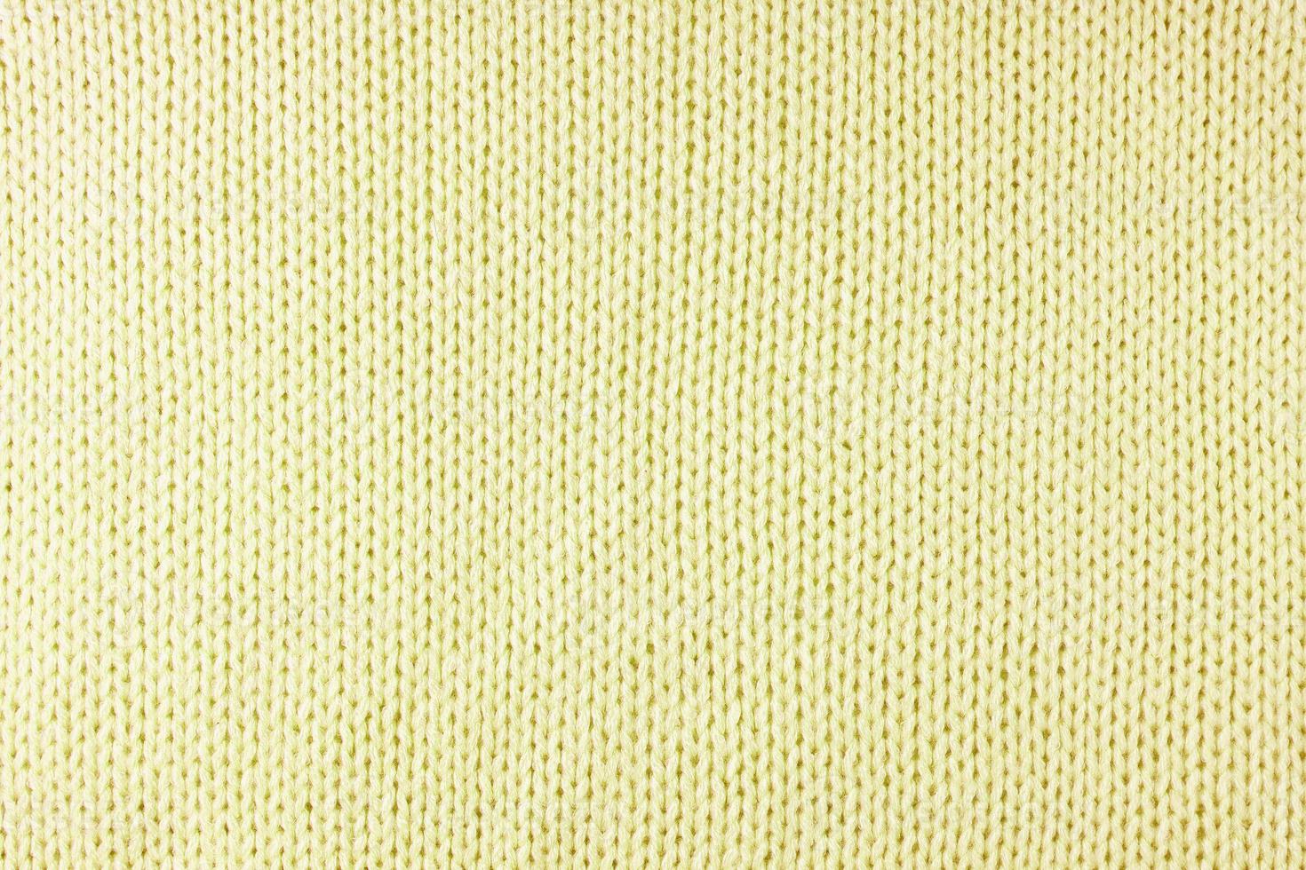 Fondo de textura de tela de lana de punto amarillo brillante. telón de fondo textil abstracto foto