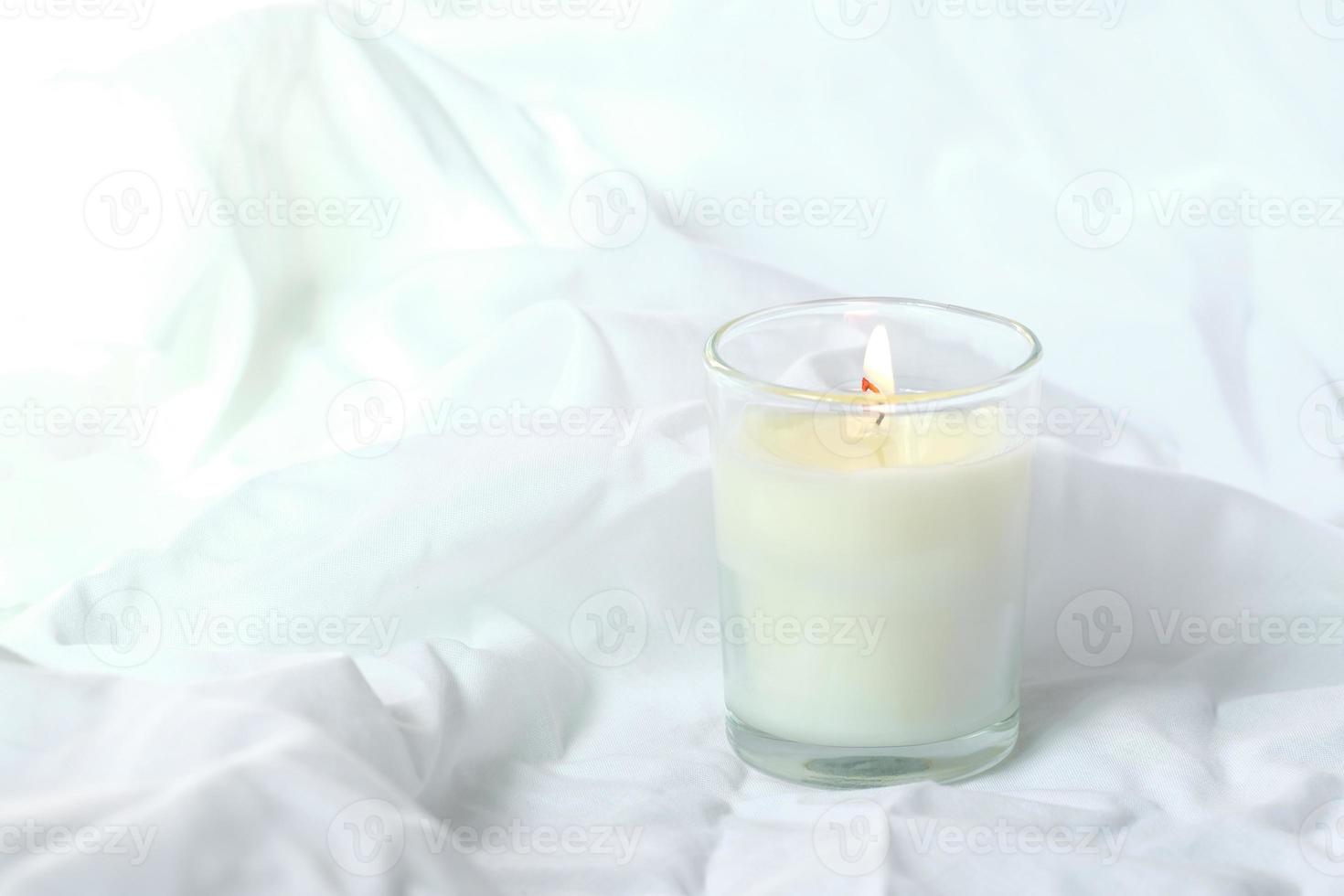 Luxury Cozy candle in jar with white fabric background, Dry reeds boho style. Burning scented candle, Handmade wax candle, High quality photo, valentine romance concept photo