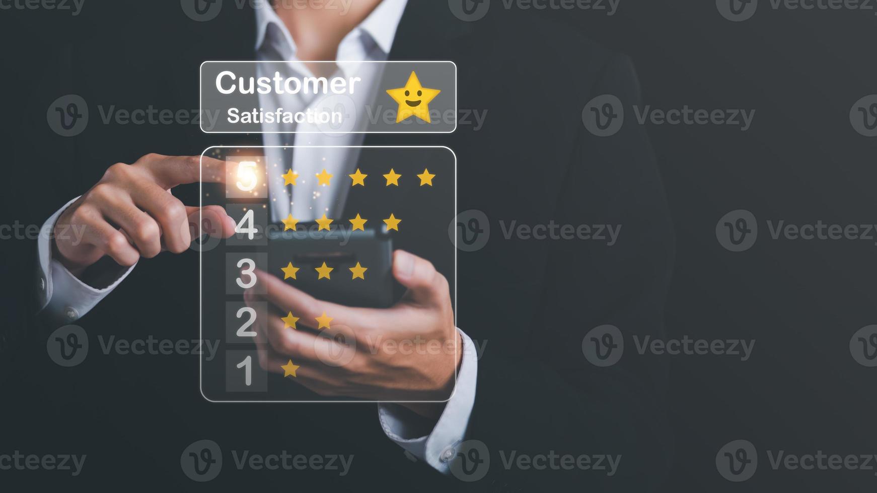 customer service and satisfaction concept,service satisfaction,very impressive rating,Evaluation and Audit,Businessman pointing 5 stars icon representing the highest quality in goods and services. photo