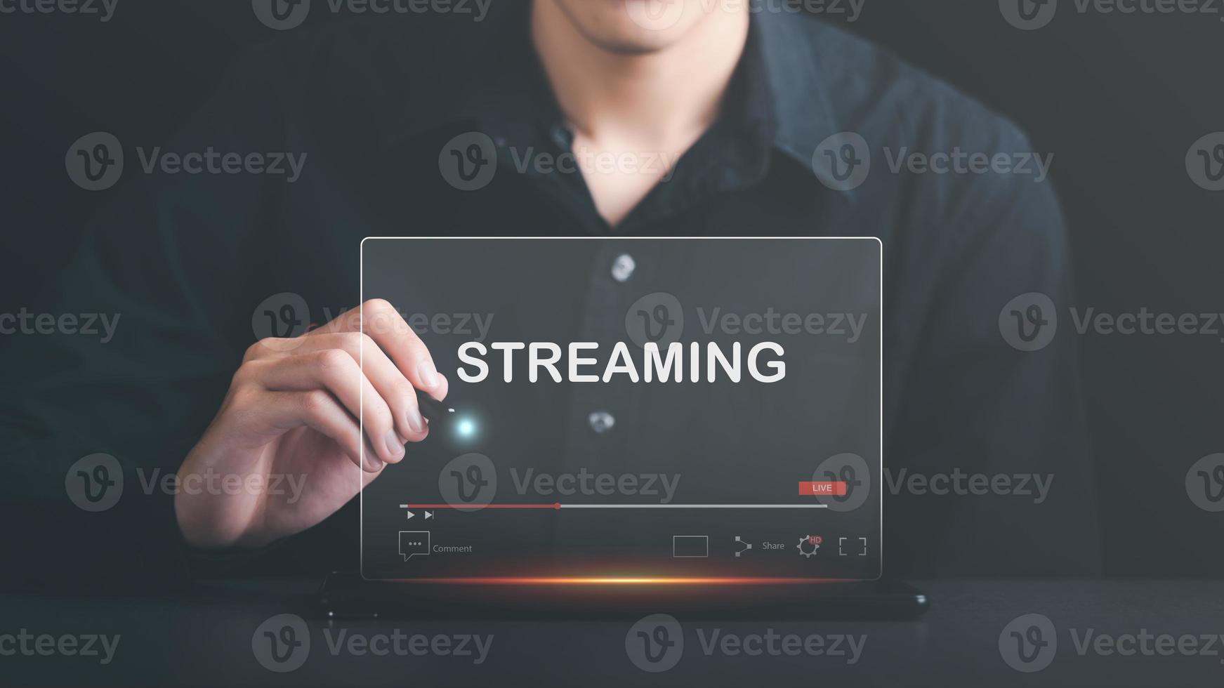 a man pointing at virtual reality icon,to watch videos via wireless technology,Training, learning, teaching,virtual reality used in online video conferencing,Online streaming Watch videos on Internet photo