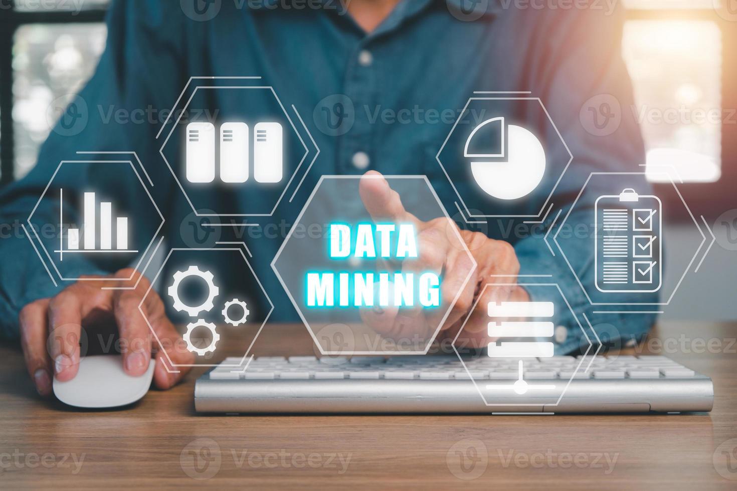 Data mining for business and organization, Businessman hand touching data mining icon on VR screen, internet and networking concept. photo