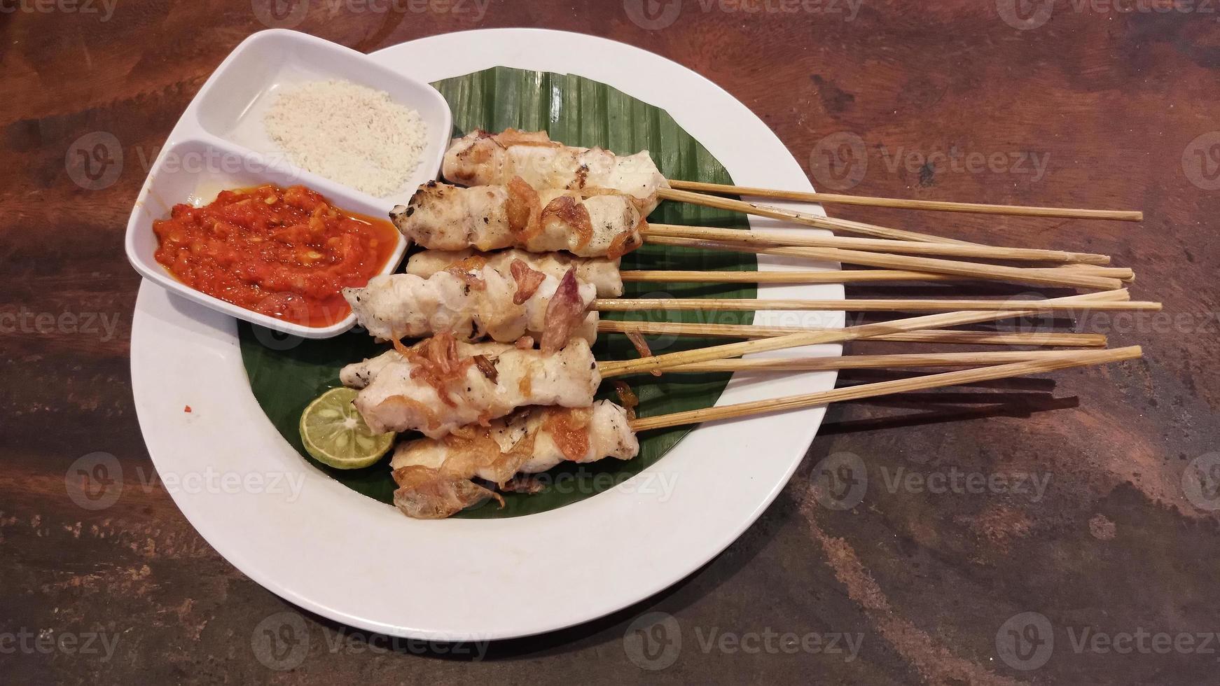 Chicken grilled satay skewers photo