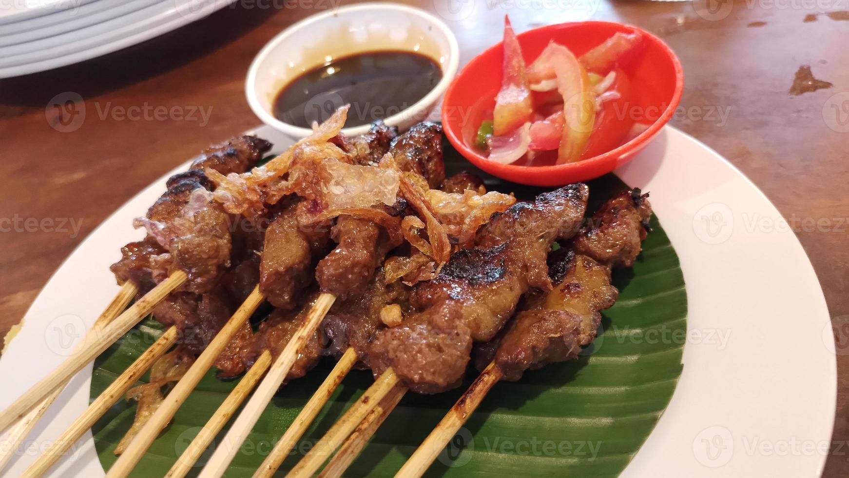 Chicken grilled satay skewers photo