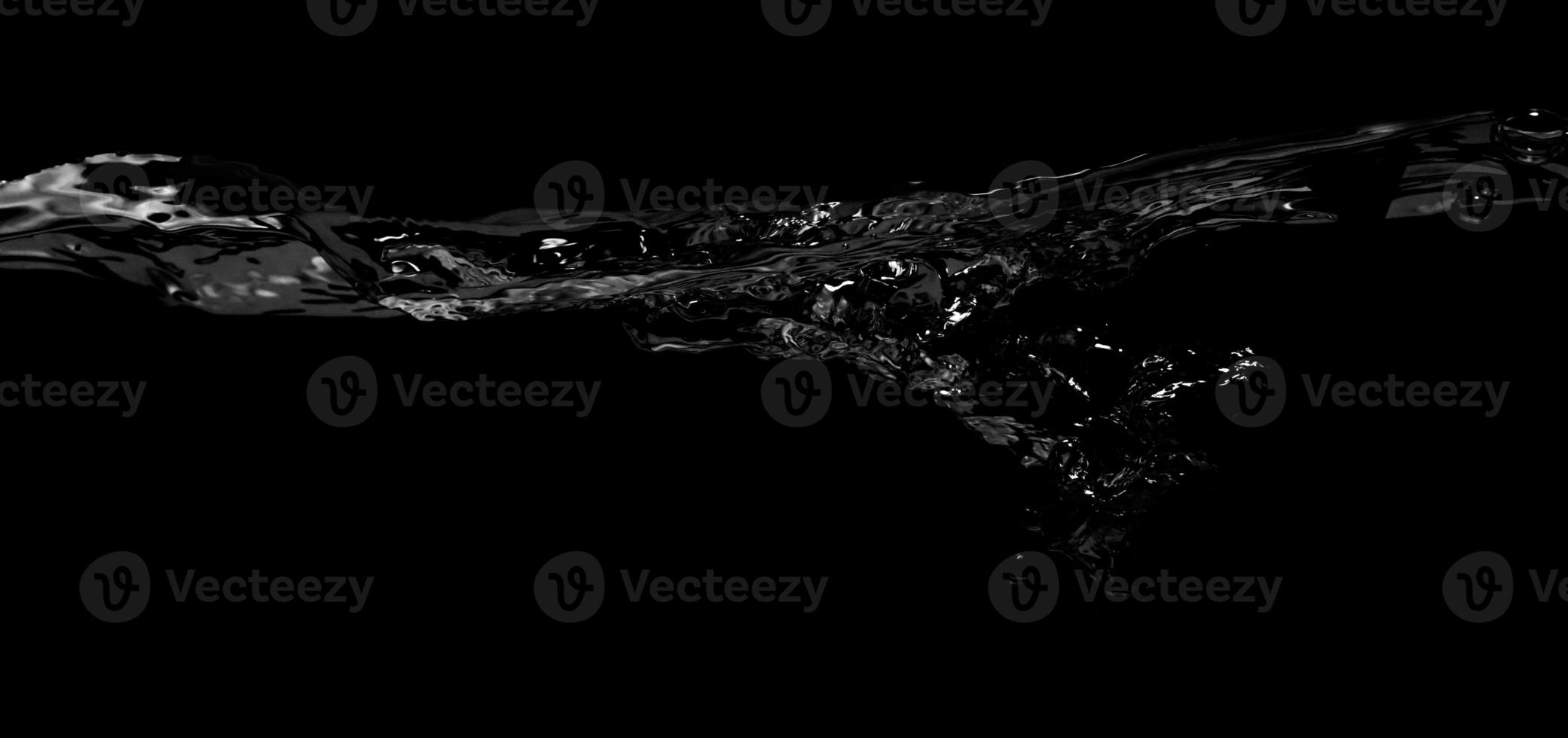 Liquid suface line between underwater and above water with black background. photo