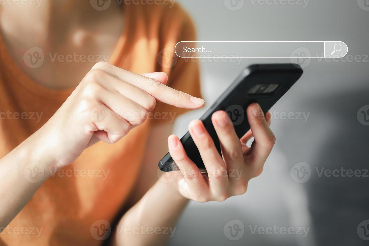 Woman using a Smart phone to Searching for information with the Search bar, Web browser, Data Search, Search Engine, Technology Concept photo