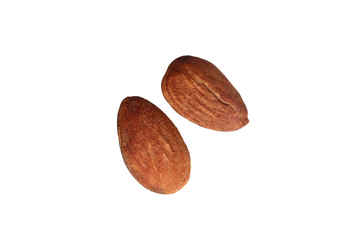 heap of almonds on a white background photo