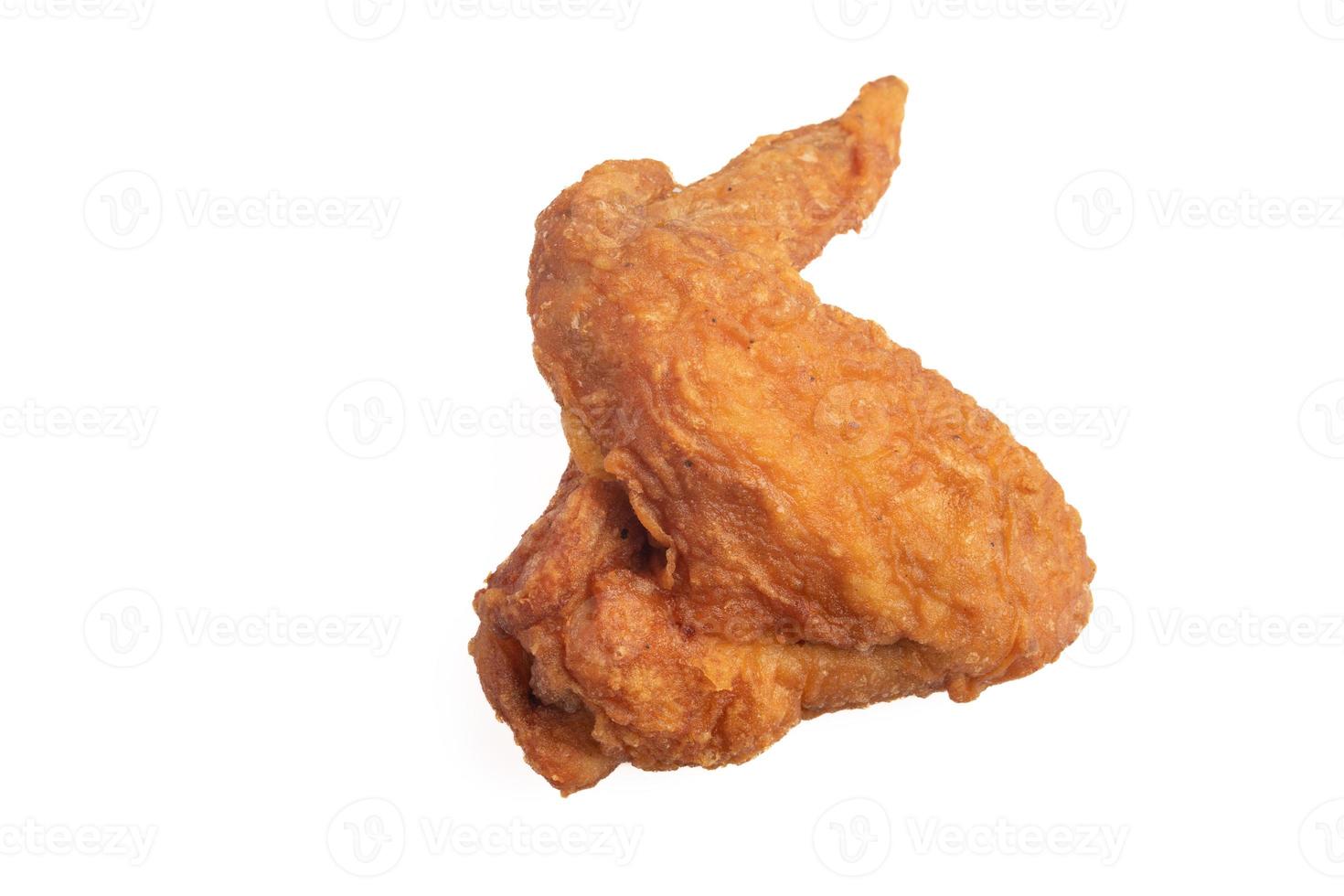 Crispy fried chicken wings on a white background photo