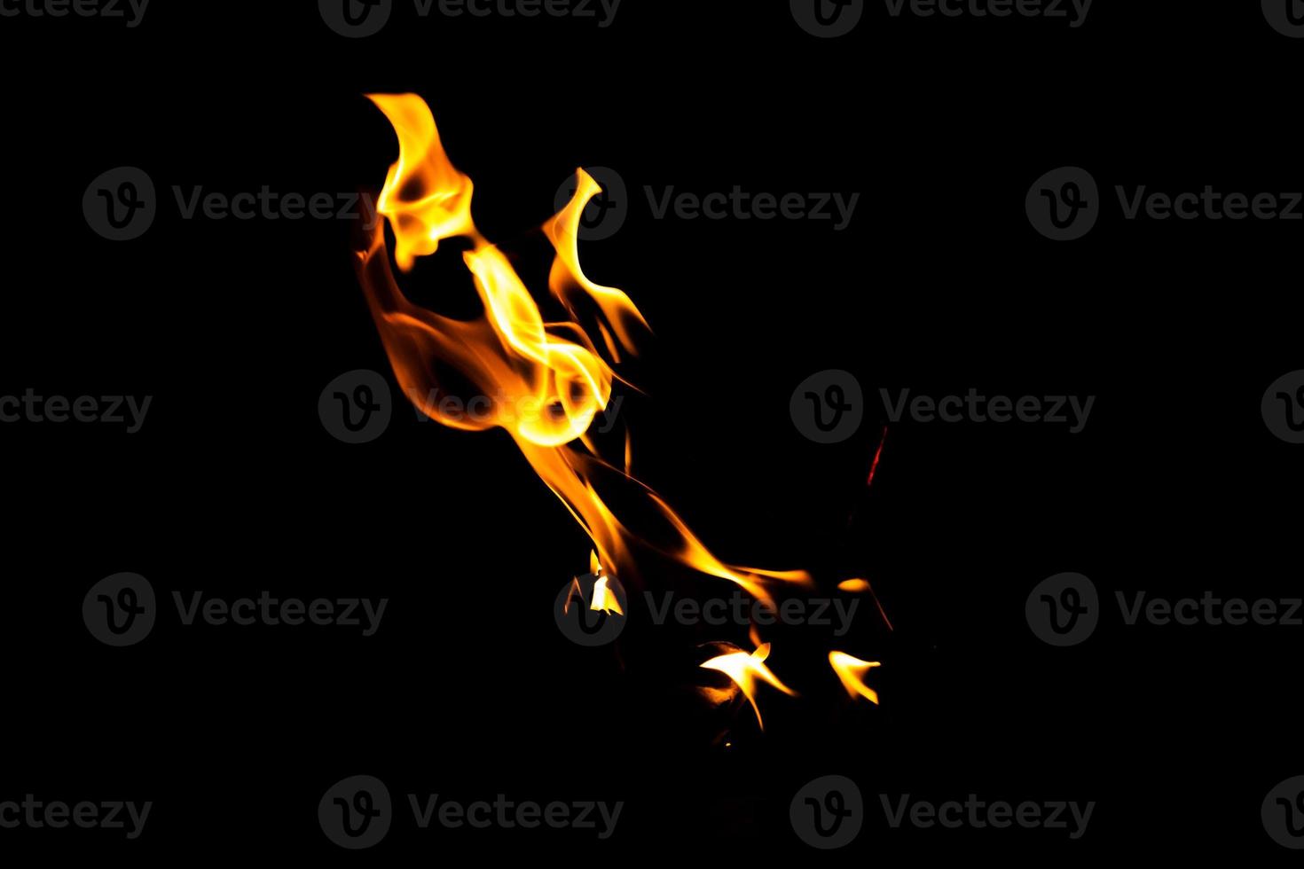 Fire flame texture. Burning material backdrop. Burn effect pattern. Blaze and torch wallpaper. Heat and haze backdrop. photo