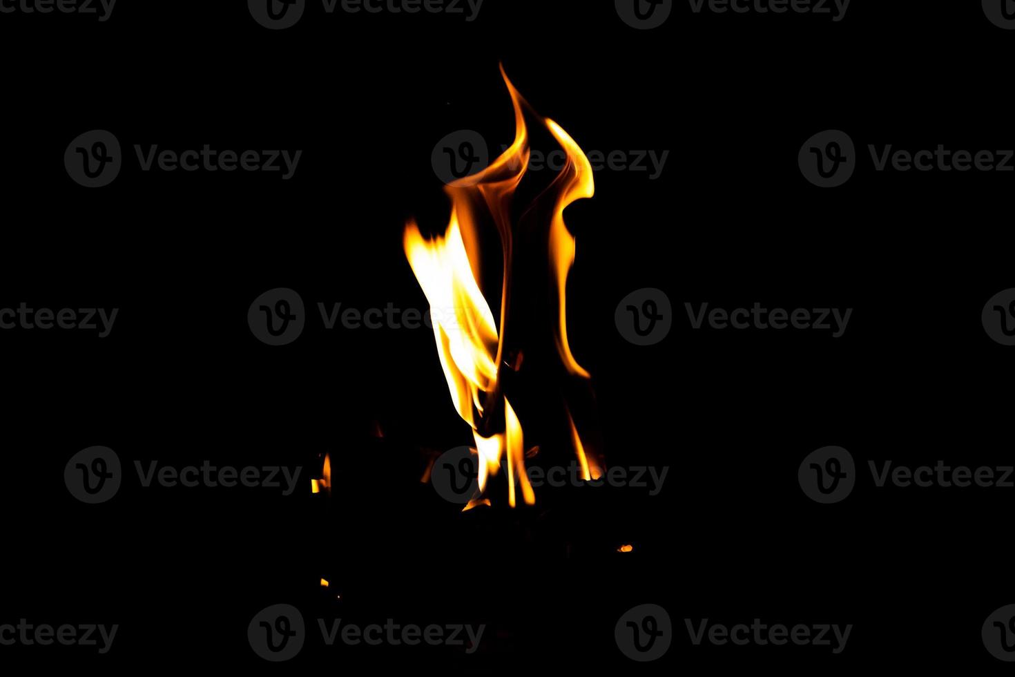 Fire flame texture. Burning material backdrop. Burn effect pattern. Blaze and torch wallpaper. Heat and haze backdrop. photo