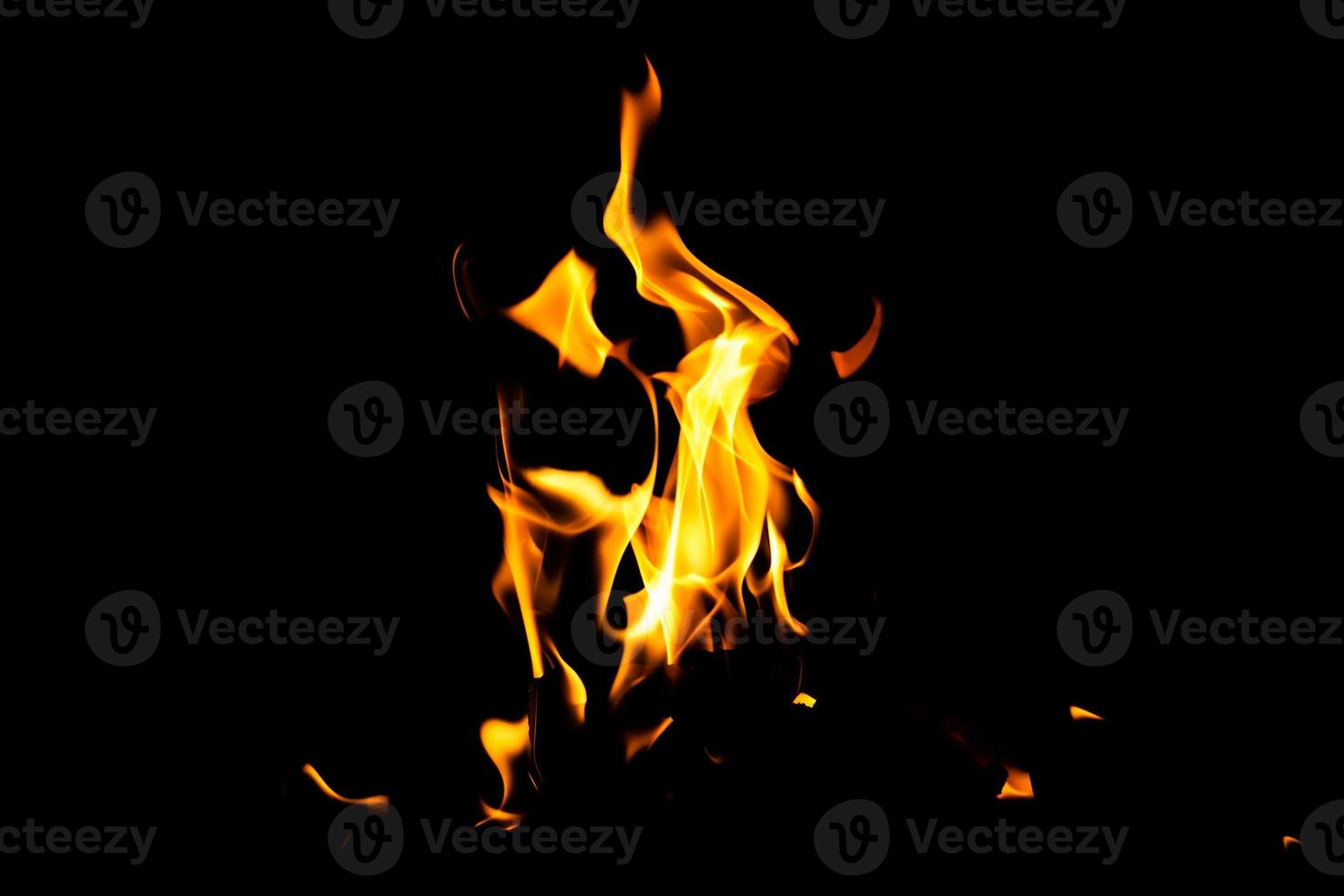 Fire flame texture. Burning material backdrop. Burn effect pattern. Blaze and torch wallpaper. Heat and haze backdrop. photo