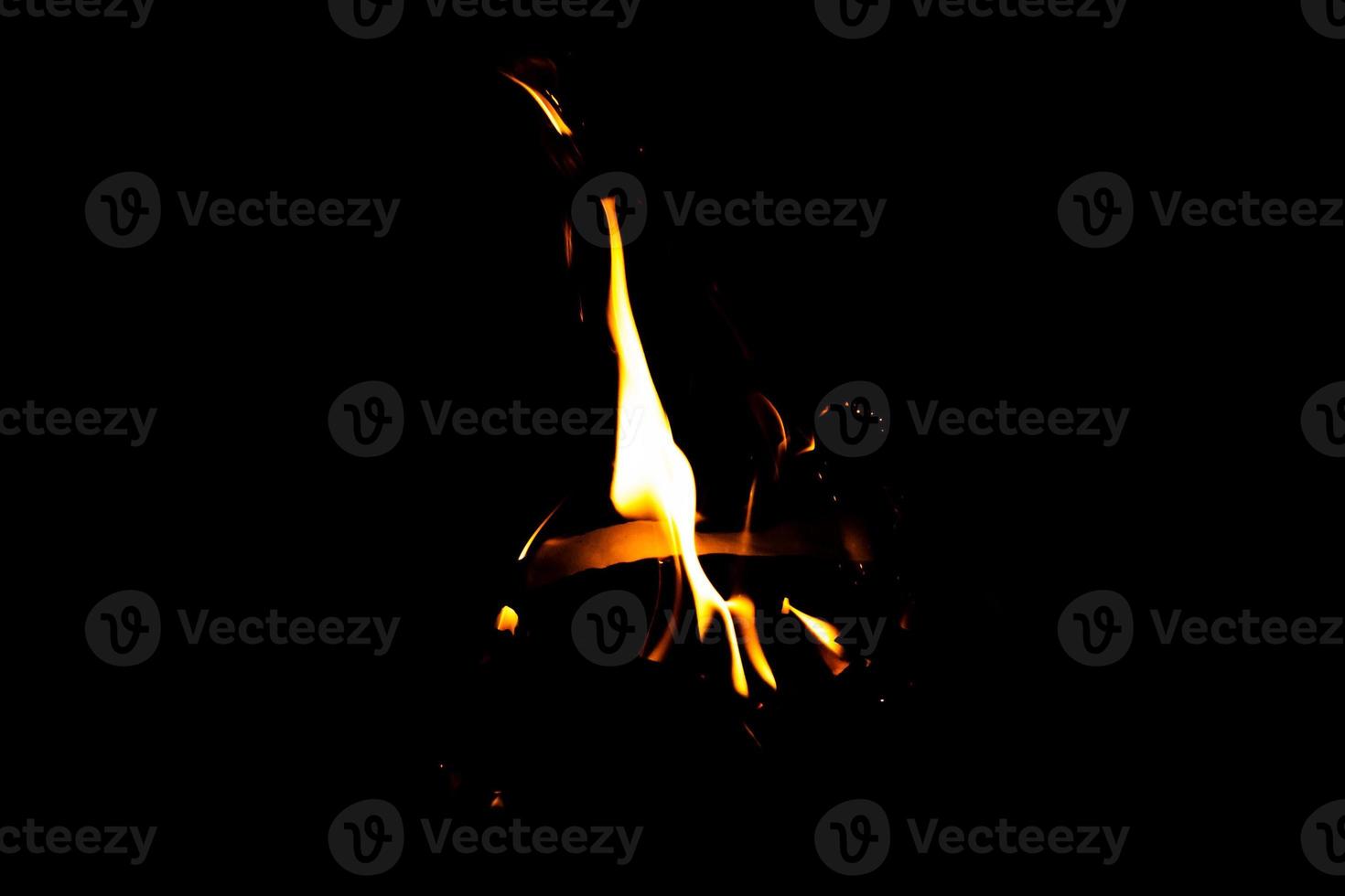 Fire flame texture. Burning material backdrop. Burn effect pattern. Blaze and torch wallpaper. Heat and haze backdrop. photo