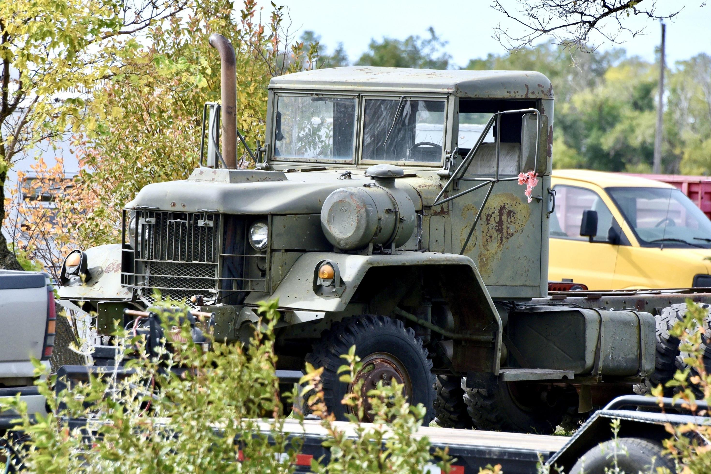 old surplus military truck om a farm 17342139 Stock Photo at Vecteezy