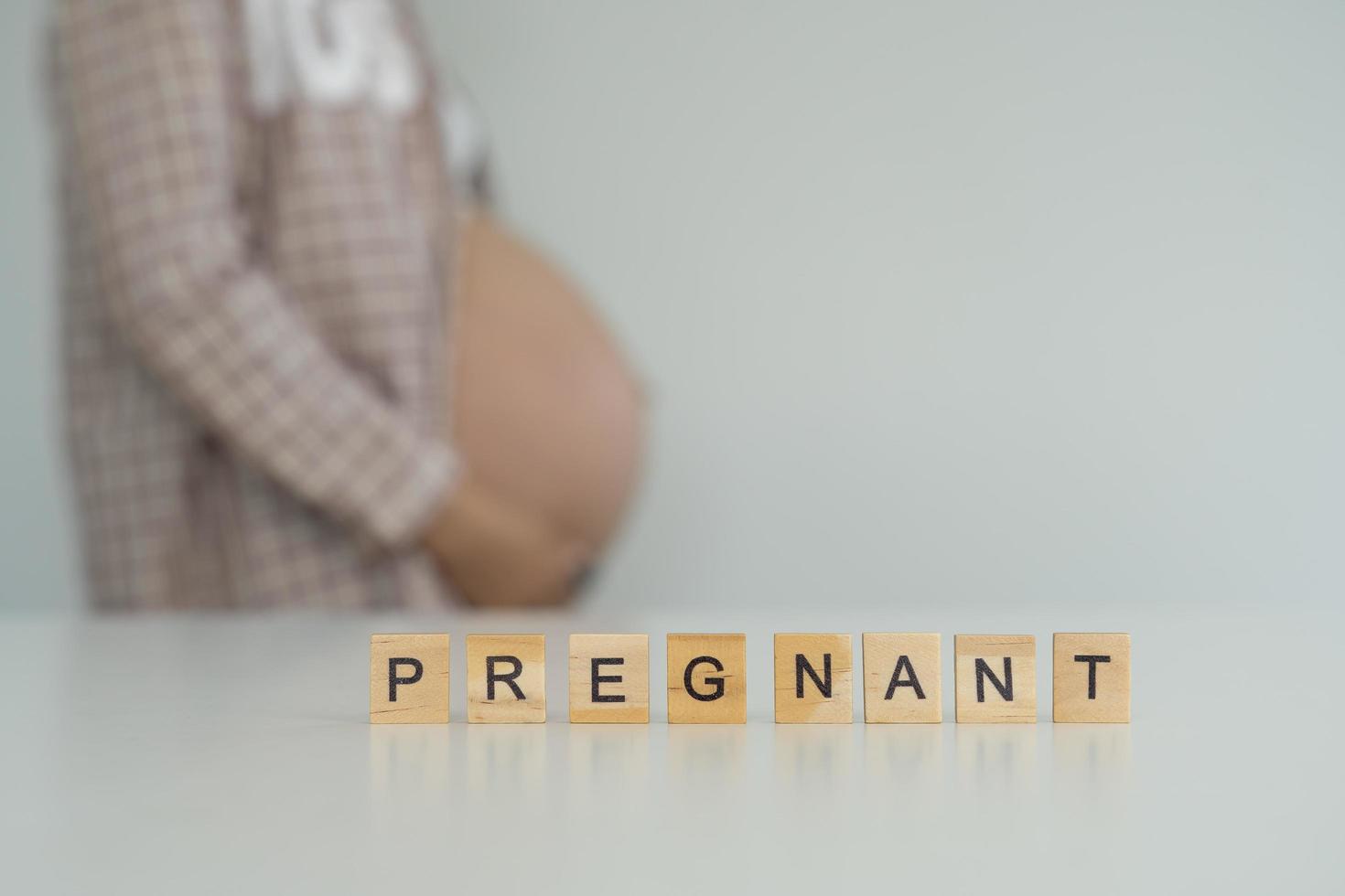 The letter is written by the pregnant person. Used for pregnancy photo
