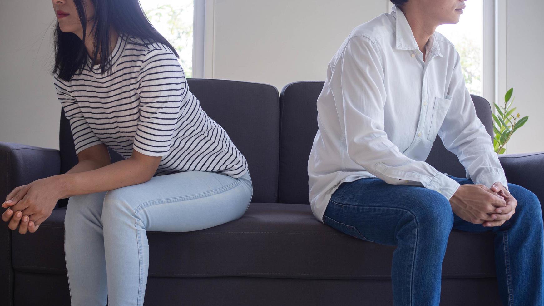 Asian women mourn and become irritated by their husband's behavior. After an argument and causing pain in the heart. Angry and not understanding each other, resulting to divorce photo