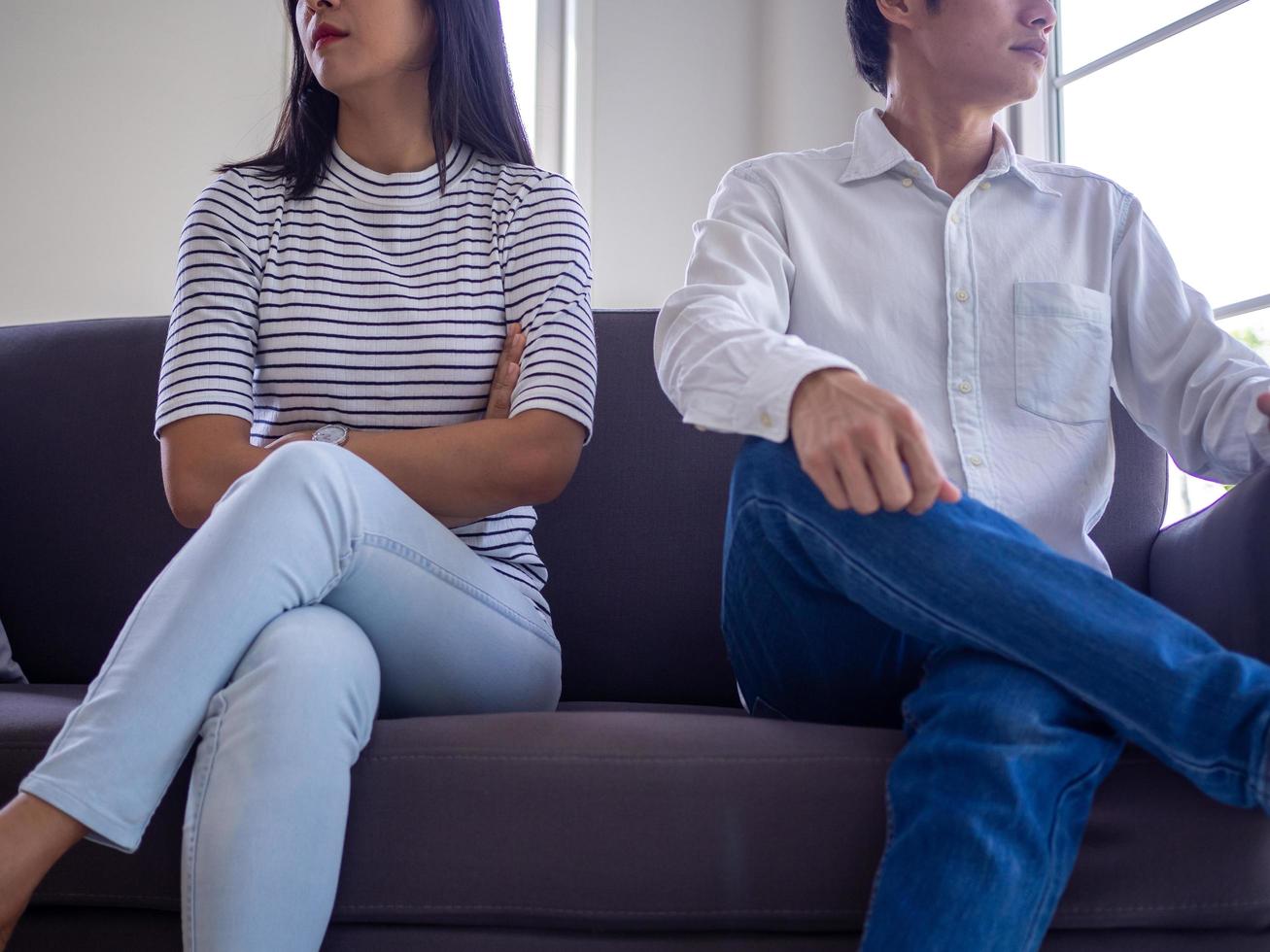 Asian women mourn and become irritated by their husband's behavior. After an argument and causing pain in the heart. Angry and not understanding each other, resulting to divorce photo