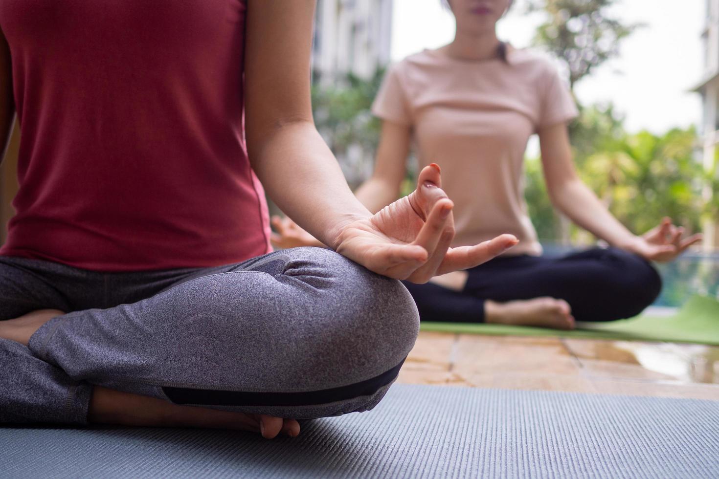 Yoga and meditation by the hands of women who meditate, health care, lifestyle concepts, exercise style photo